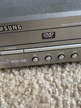 Samsung VCR/DVD Player - Silver. VHS working. DVD not working.